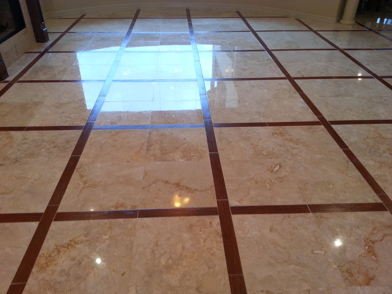 We polish this marble floor in the Houston area.